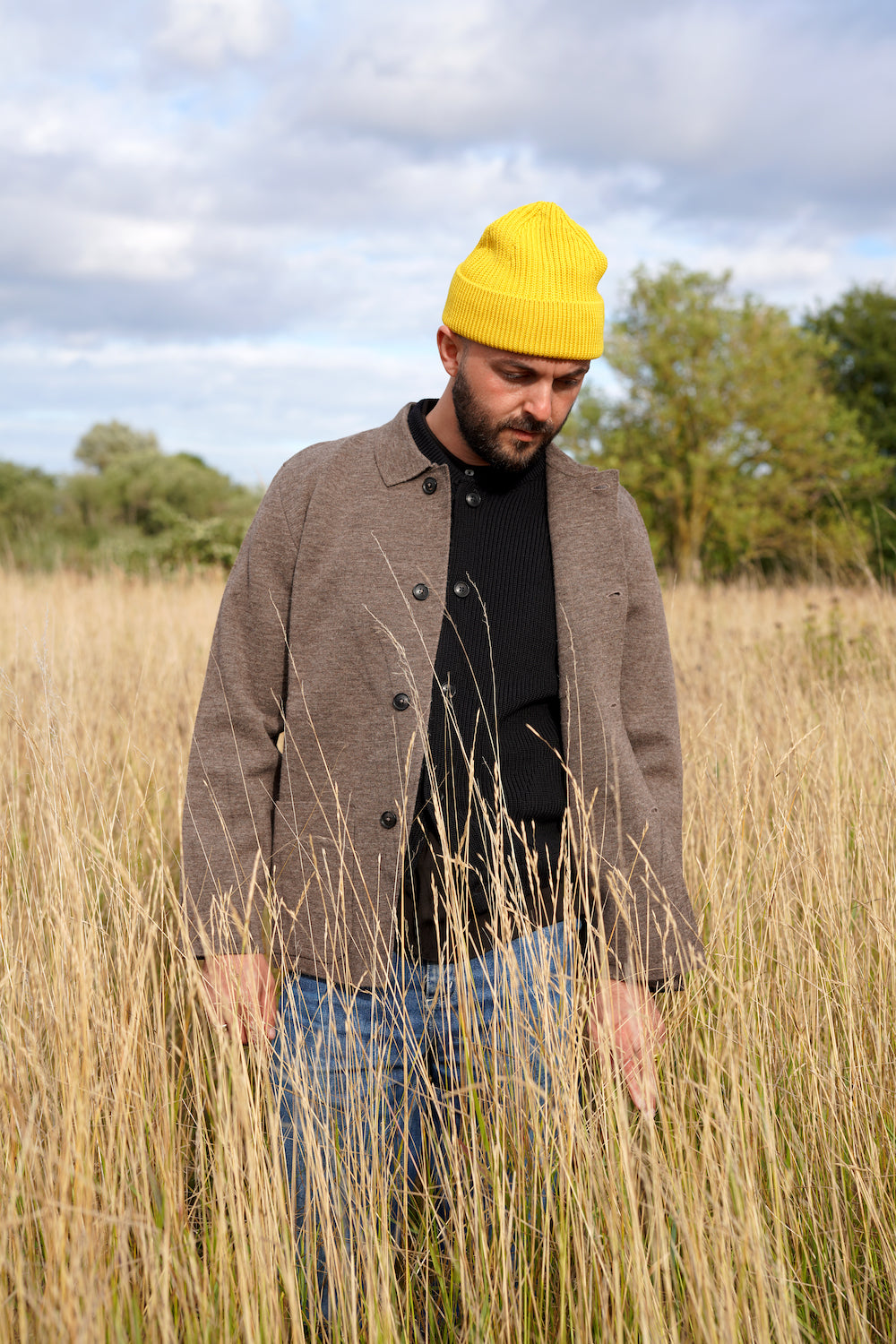 Alf wearing Work Jacket in Natural Taupe and Beanie Long in Yellow
