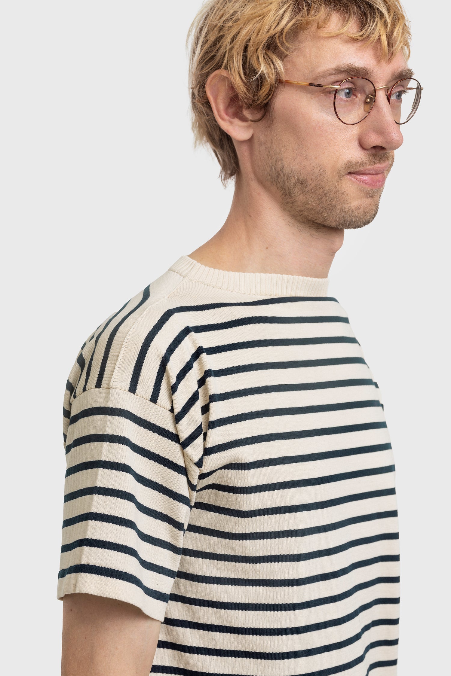 Jens Peter wearing Boatsman Short in Raw Cotton with Royal Blue stripes 