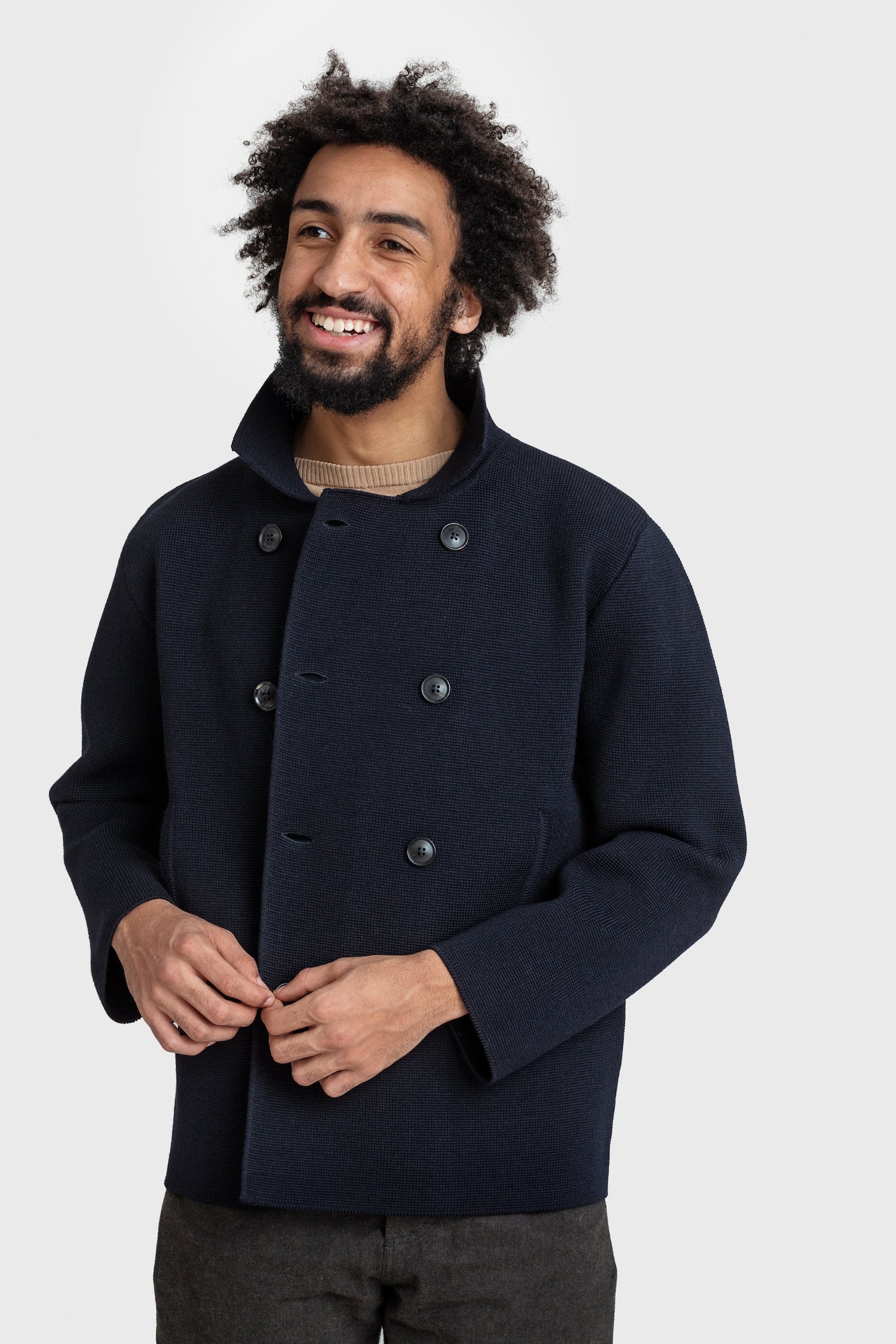 Isaac wearing Peacoat in Navy Blue