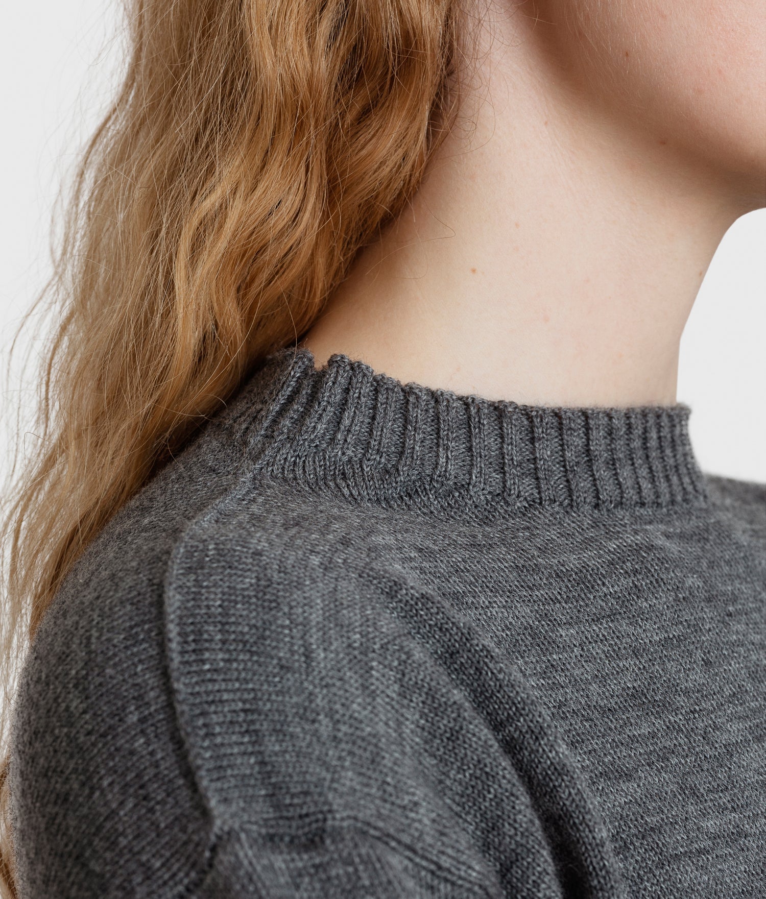 Neck and linking detail on Seaman Crewneck in Grey